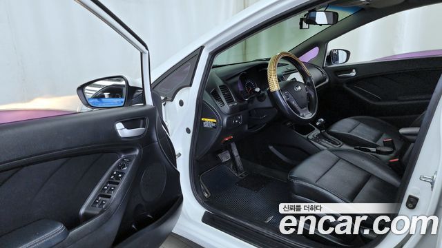 Kia K3 2013 — photo 10