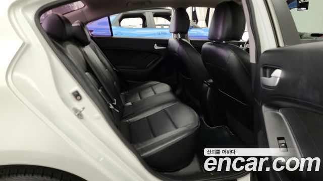 Kia K3 2013 — photo 12