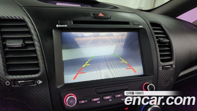 Kia K3 2013 — photo 15
