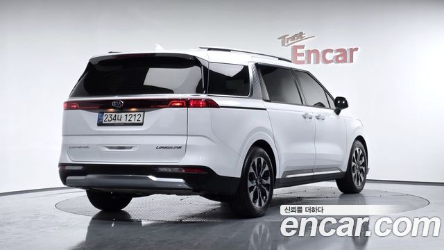 Kia Canival 2021 — photo 2