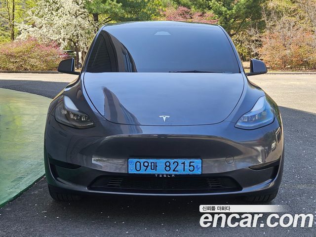 Tesla Model Y 2025 — photo 1