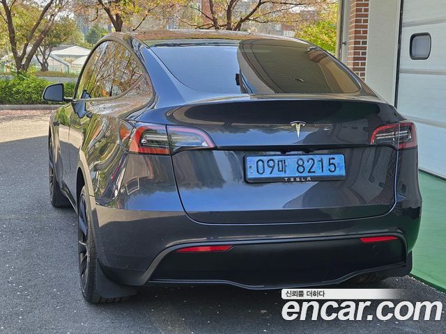 Tesla Model Y 2025 — photo 4