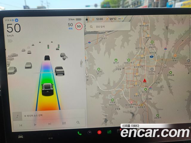 Tesla Model Y 2025 — photo 17