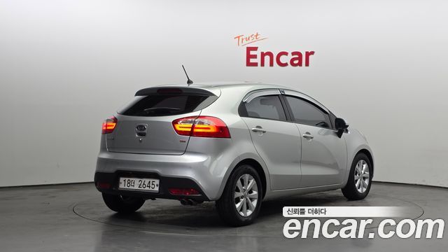 Kia pride 2012 — photo 2
