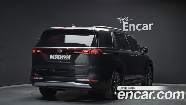 Kia Canival 2021 — photo 2