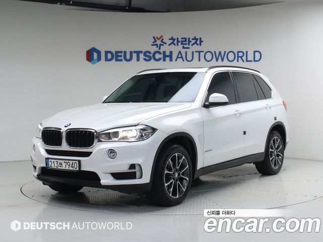 BMW X5 2014 — photo 1