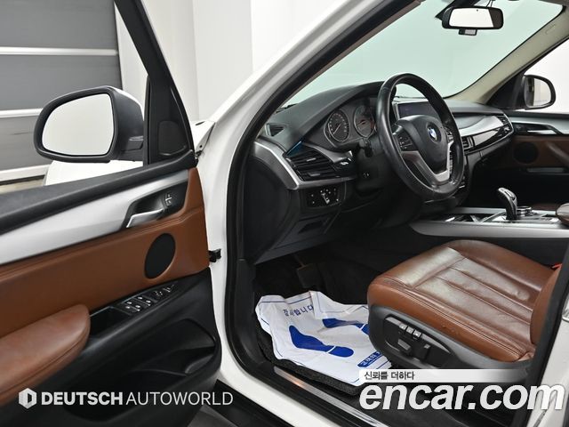 BMW X5 2014 — photo 11