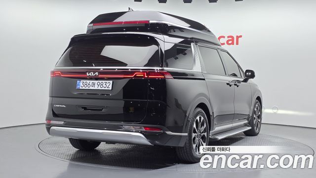 Kia Canival 2022 — photo 2
