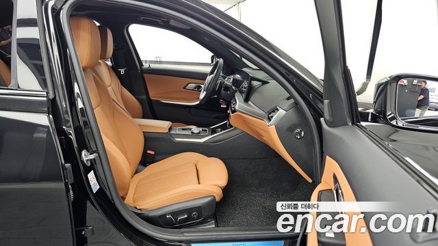 BMW 3-Series 2024 — photo 11