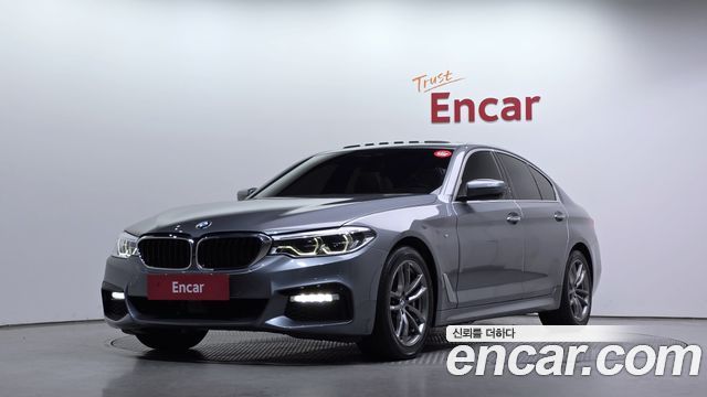 BMW 5-Series 2018 — photo 1