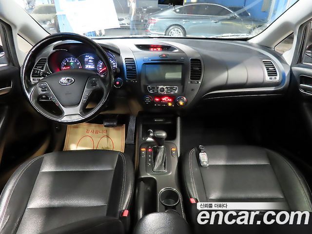 Kia K3 2013 — photo 5