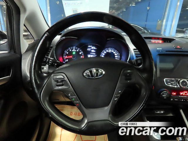 Kia K3 2013 — photo 9