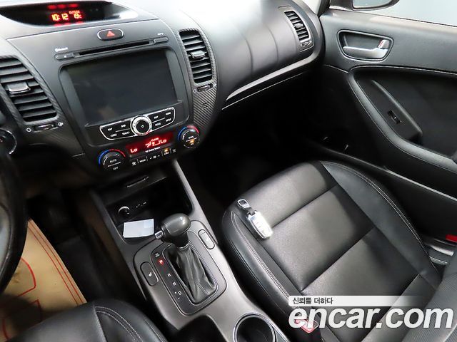 Kia K3 2013 — photo 10