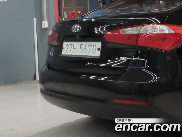 Kia K3 2013 — photo 18