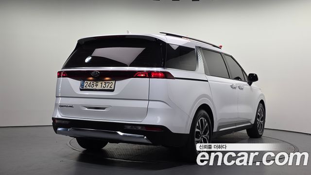 Kia Canival 2021 — photo 2