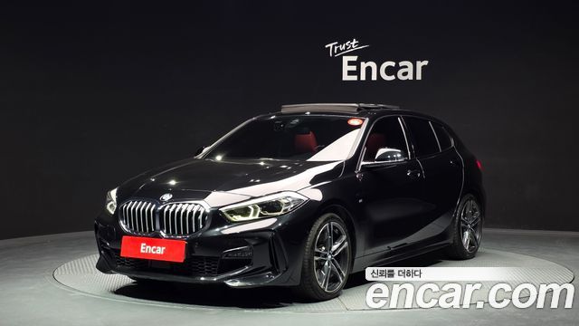 BMW 1-Series 2021 — photo 1