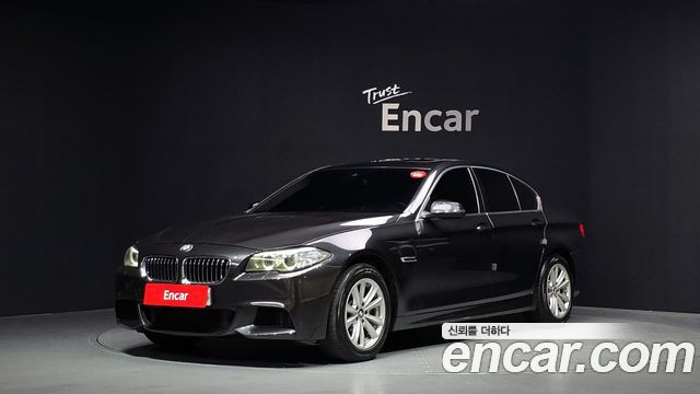BMW 5-Series 2015 — photo 1