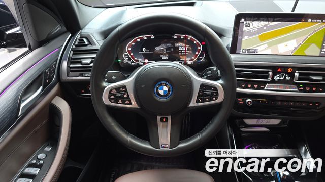BMW iX3 2023 — photo 18