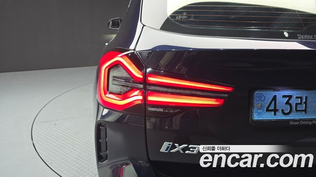 BMW iX3 2023 — photo 9
