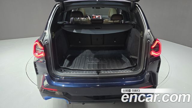 BMW iX3 2023 — photo 31