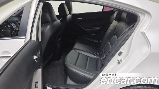 Kia K3 2013 — photo 11