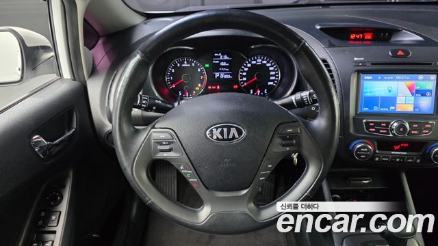Kia K3 2013 — photo 13