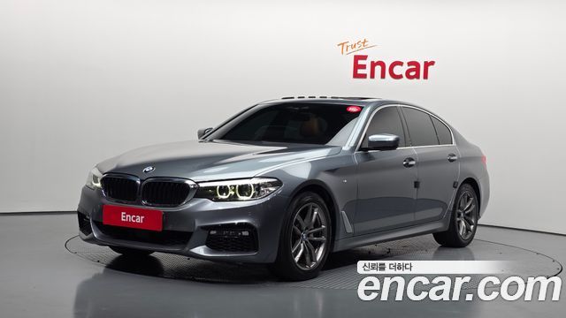 BMW 5-Series 2018 — photo 1