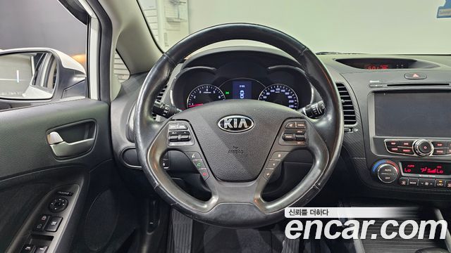 Kia K3 2015 — photo 19