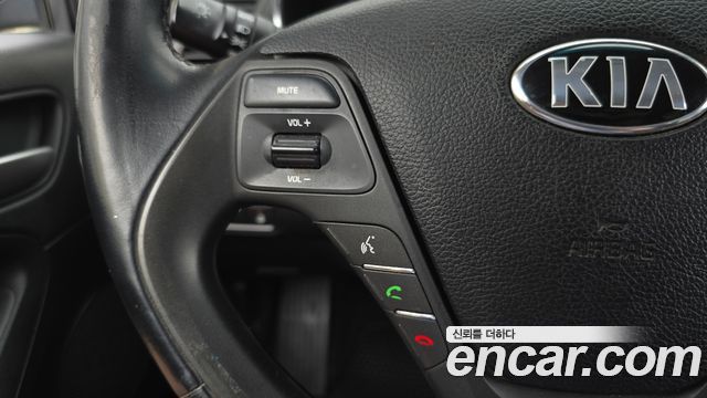 Kia K3 2015 — photo 21
