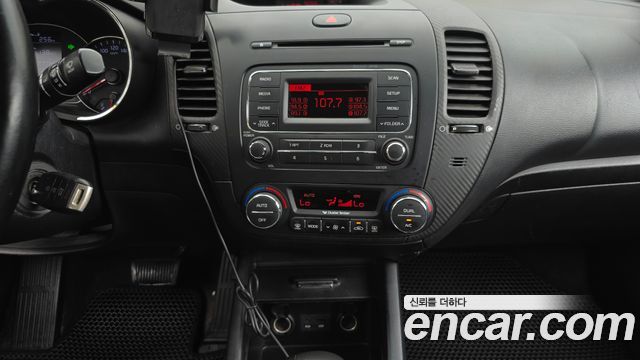 Kia K3 2015 — photo 32