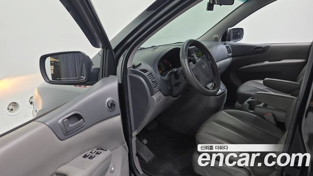 Kia Canival 2009 — photo 11