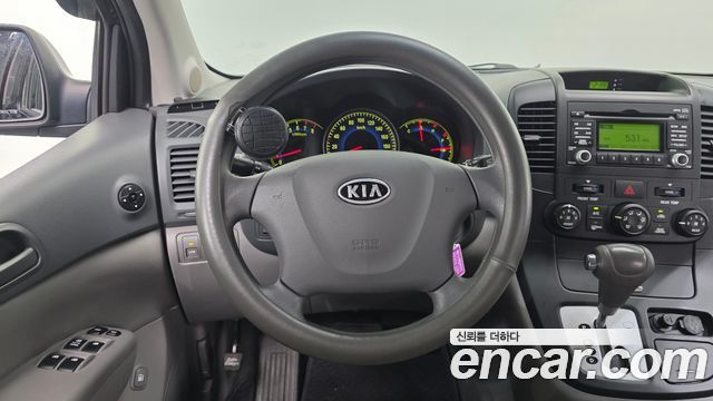 Kia Canival 2009 — photo 14