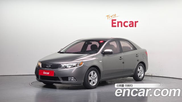 Kia Porte 2011 — photo 1