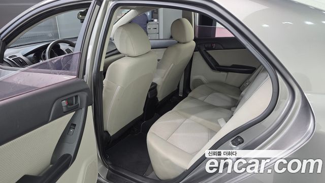 Kia Porte 2011 — photo 11