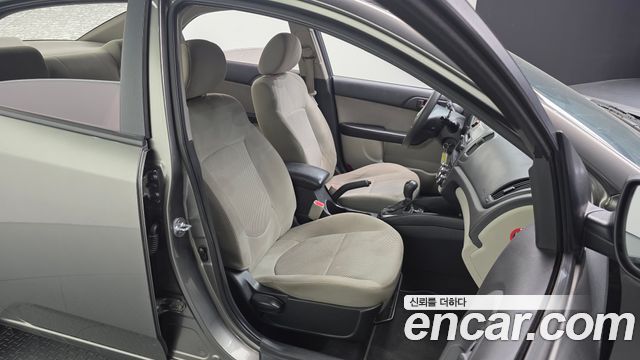 Kia Porte 2011 — photo 12