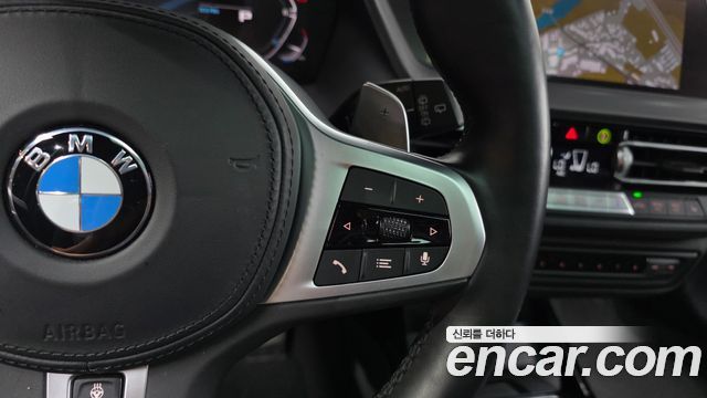BMW 1-Series 2022 — photo 24