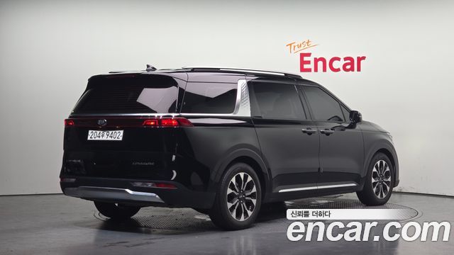 Kia Canival 2021 — photo 2