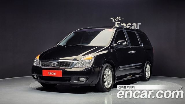 Kia Canival 2012 — photo 1