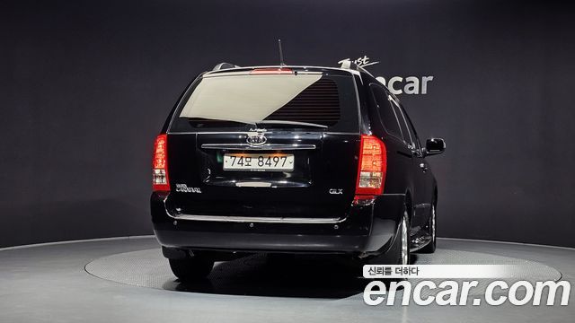 Kia Canival 2012 — photo 4