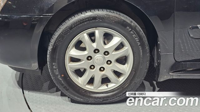 Kia Canival 2012 — photo 5