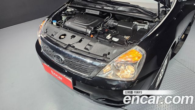 Kia Canival 2012 — photo 6