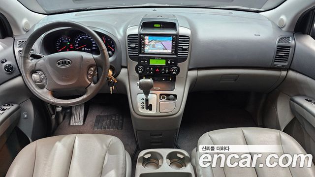 Kia Canival 2012 — photo 10