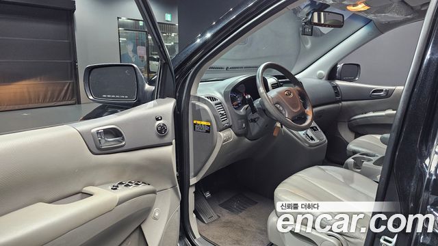 Kia Canival 2012 — photo 13