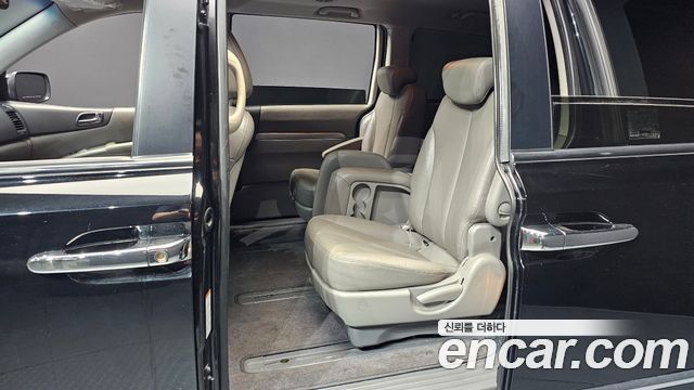 Kia Canival 2012 — photo 18