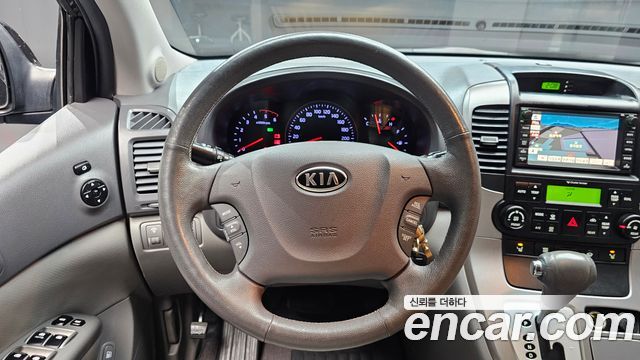 Kia Canival 2012 — photo 19