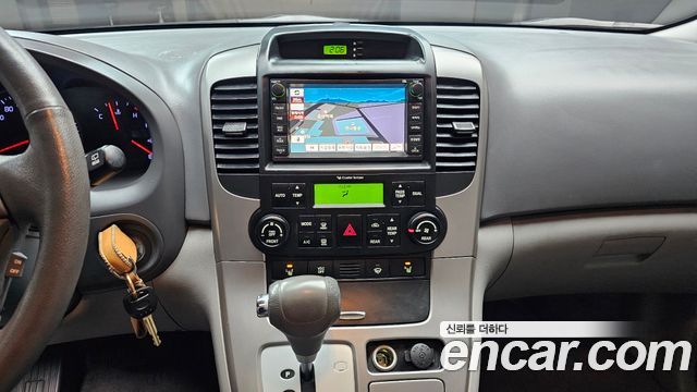 Kia Canival 2012 — photo 20