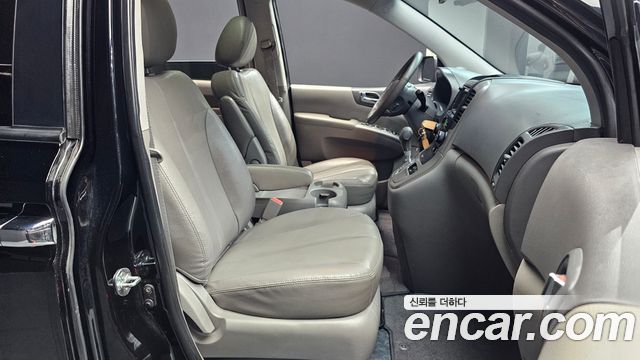 Kia Canival 2012 — photo 16