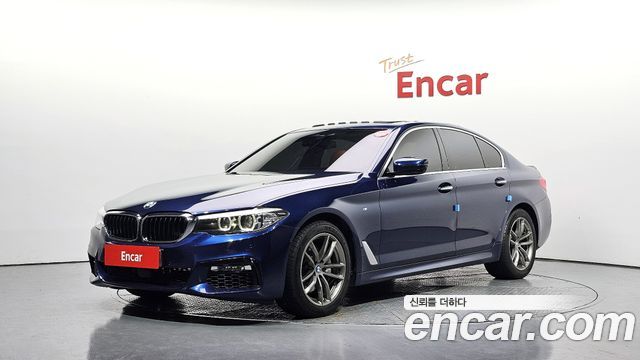 BMW 5-Series 2018 — photo 1