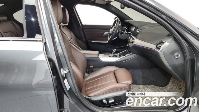 BMW 3-Series 2022 — photo 16