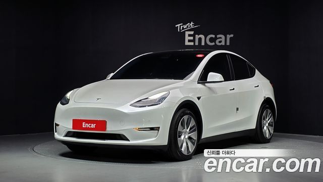 Tesla Model Y 2021 — photo 1